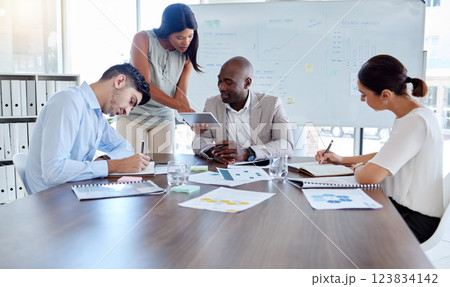 Planning, project management or tablet review with business people in meeting for marketing strategy, documents or research. Mentor, analytics or teamwork with leader working on data on future growth 123834142