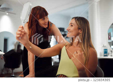 Hairdresser, salon and hair, woman and mirror, happy about haircut in professional hairstyle boutique. Small business, consultation success with client and beauty, grooming and haircare. Hairdresser, salon and hair, woman and mirror, happy about haircut in professional hairstyle boutique. Small business, consultation success with client and beauty, grooming and haircare. 123834305