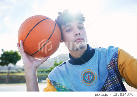 Athlete on outdoor basketball court, ball in hand for sports fitness and game focus to win competitive game in Brazil. Motivation, active concentration and talent for winning sports match competition 123834370