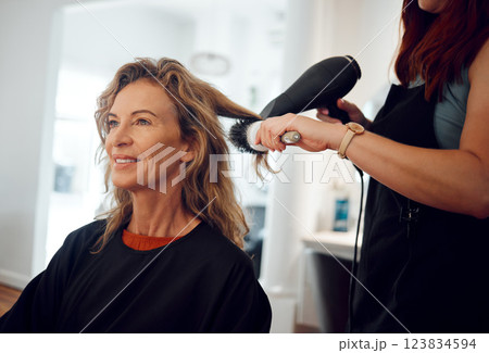 Hair care, hairdresser and senior woman client hair treatment, professional salon service and hairdryer. Small business, elderly female and brush modern hairstyle, happy customer and beautician lady. 123834594