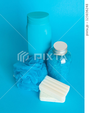 Soap Bar on Blue, Body Care Cosmetic, Flavored Soapy Detergent, Bath Salt, Loofah, Shampoo, White Soaps 123836248