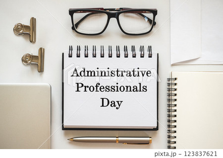 Happy Administrative Professionals Day. Notepad with congratulatory inscriptions Happy Administrative Professionals Day. Notepad with congratulatory inscriptions 123837621