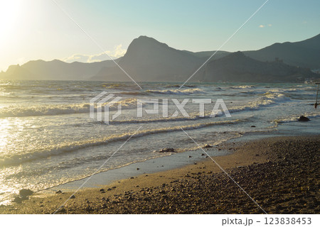 Background landscape view of Sudak Bay, the city of Sudak and its embankment in Crimea Background landscape view of Sudak Bay, the city of Sudak and its embankment in Crimea 123838453
