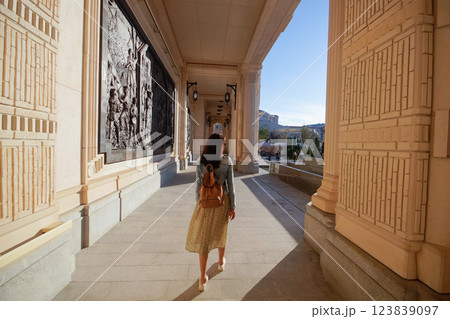 Crimea, Sevastopol. Museum and temple complex New Chersonesos. A woman walks in the new park of Chersonesus. 123839097