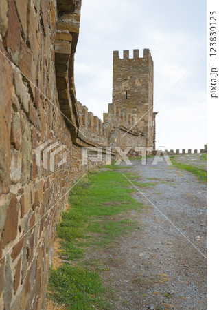Sudak fortress. Crimea - October 09, 2024 - Old Genoese fortress in the city of Sudak in summer. Ancient architecture of Crimea. 123839125