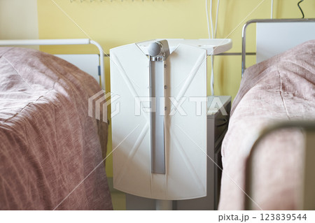 A plastic folding table between the beds. A hospital ward with two specially designed beds for patients awaiting hospitalization. High quality photo 123839544