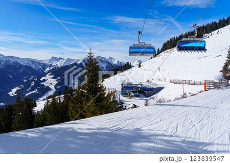 Experience the Thrill of Skiing Down the Stunning Slopes of Austria, Alps with Breathtaking Views Experience the Thrill of Skiing Down the Stunning Slopes of Austria, Alps with Breathtaking Views 123839547