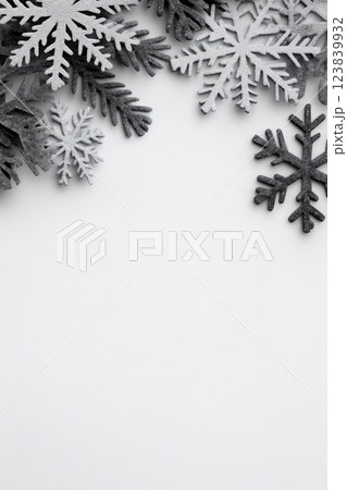 Winter decorations featuring snowflakes on a neutral background 123839932