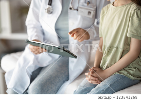 patient with a doctor in medical office patient with a doctor in medical office 123841269