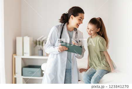 patient with a doctor in medical office patient with a doctor in medical office 123841270