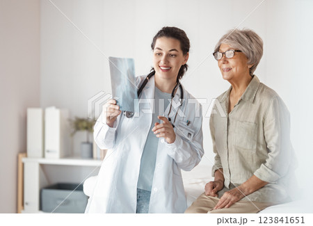 patient with a doctor in medical office patient with a doctor in medical office 123841651