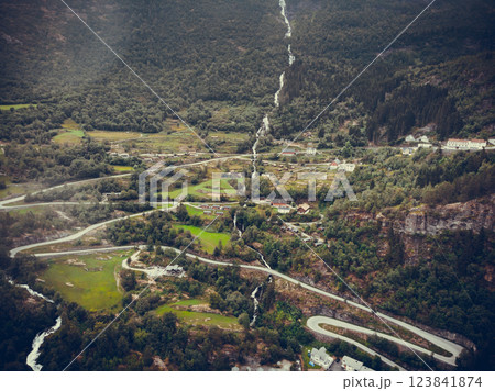 Road winding through mountain Geiranger valley Road winding through mountain Geiranger valley 123841874