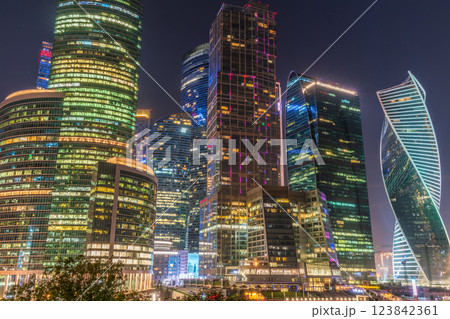 Moscow city at summer night. Modern skyscrapers in Moscow-city downtown. Moscow, Russia Moscow city at summer night. Modern skyscrapers in Moscow-city downtown. Moscow, Russia 123842361