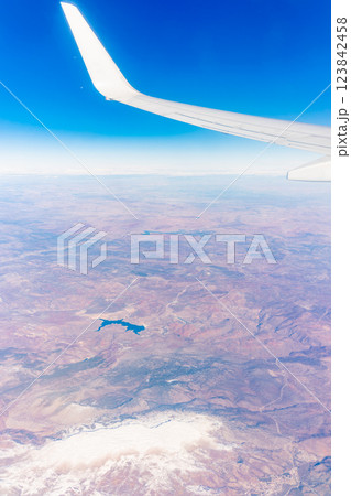 Aerial view on arabian desert and Red sea mountains from airplane 123842458
