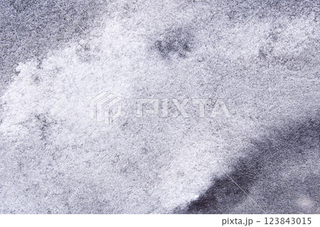 Abstract textured surface with gray and white patterns in natural lighting Abstract textured surface with gray and white patterns in natural lighting 123843015