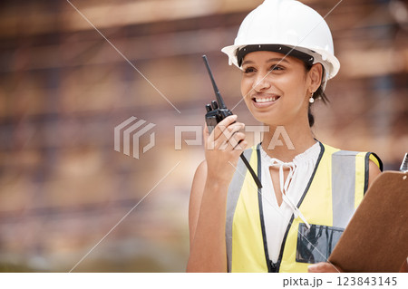 Construction site, contractor and woman talking radio communication, industrial building project management and architecture planning. Happy female engineering, development manager or city technician Construction site, contractor and woman talking radio communication, industrial building project management and architecture planning. Happy female engineering, development manager or city technician 123843145