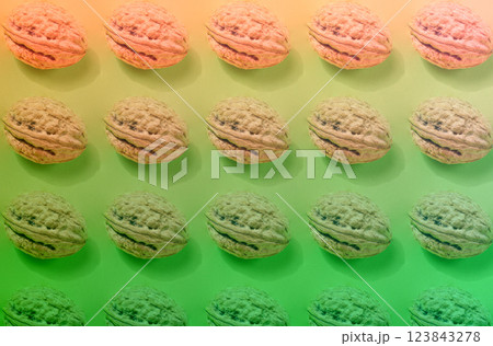 Walnut on green background, repeating pattern 123843278