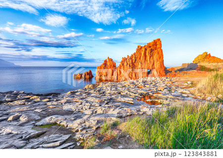 Remarkable sunset view of Red Rocks (Rocce Rosse) in Arbatax. Remarkable sunset view of Red Rocks (Rocce Rosse) in Arbatax. 123843881