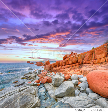 Remarkable sunset view of Red Rocks (is Scoglius Arrubius) on Cea beach 123843892