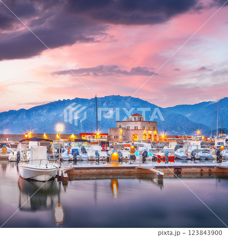 Remarkable  sunset view on boats in beautiful marina of Villasimius. 123843900
