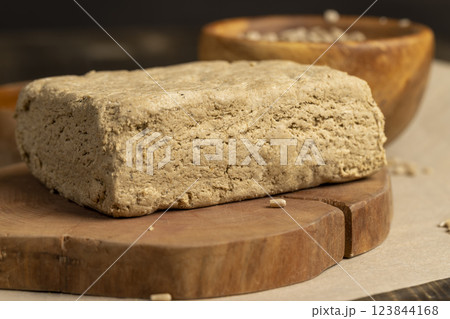 halva made from roasted sunflower seeds and crushed into one solid mass halva made from roasted sunflower seeds and crushed into one solid mass 123844168