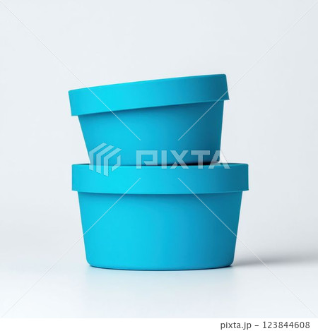 Two Turquoise-Blue Ice Cream Tubs Stacked on White Background 123844608
