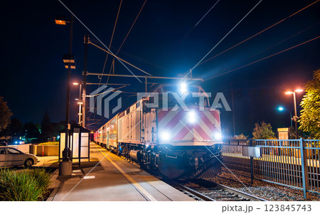 Old diesel locomotive with a commuter train at California Avenue station in Palo Alto, California, United States Old diesel locomotive with a commuter train at California Avenue station in Palo Alto, California, United States 123845743
