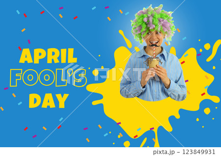 April Fool's Day, woman in clown wig holding paper cup on blue background with text April Fool's Day, woman in clown wig holding paper cup on blue background with text 123849931