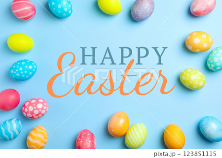 Easter, text: "Happy Easter" with eggs, on a blue background Easter, text: "Happy Easter" with eggs, on a blue background 123851115