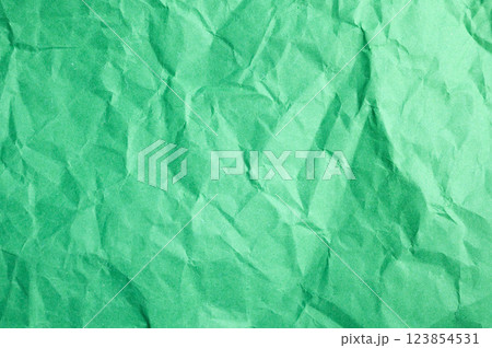 Full frame shot of crumpled green paper sheet texture and background. 123854531