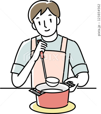 料理をするエプロンを着けた男性 123854562