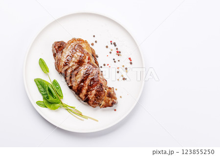A perfectly cooked striploin steak with a juicy, tender texture A perfectly cooked striploin steak with a juicy, tender texture 123855250