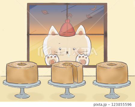 窓から三つのシフォンケーキを見つめるネコ 123855596