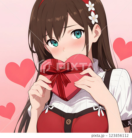プレゼントを渡す女性　贈り物　告白　バレンタイン　クリスマス　ハート 123856112