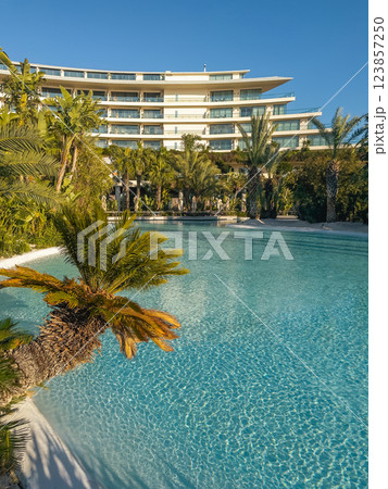Outdoor swimming pool in a tropical luxury hotel resort 123857250
