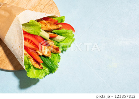wrap chicken sandwich with vegetables wrap chicken sandwich with vegetables 123857812
