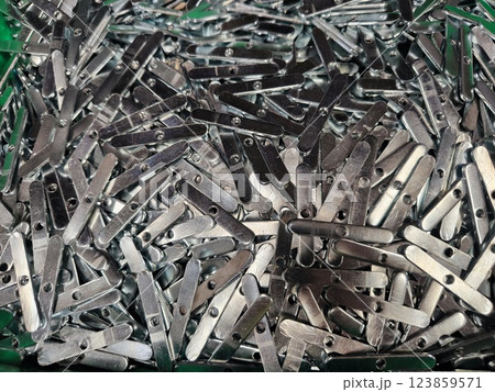 Close Up of many Metal Clips in a box 123859571