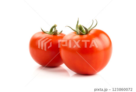 Fresh ripe red tomatoes with green stems isolated on white background. cooking healthy meals food photography kitchen vegetable dishes nutrition Fresh ripe red tomatoes with green stems isolated on white background. cooking healthy meals food photography kitchen vegetable dishes nutrition 123860072