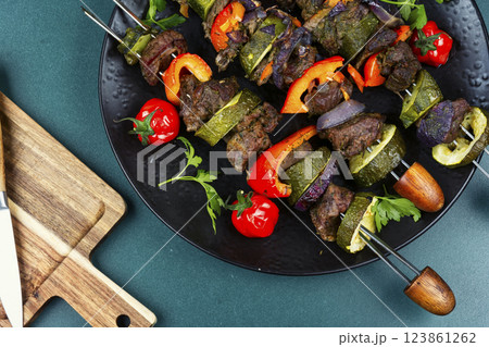 Barbecued meat with garnish. Barbecued meat with garnish. 123861262