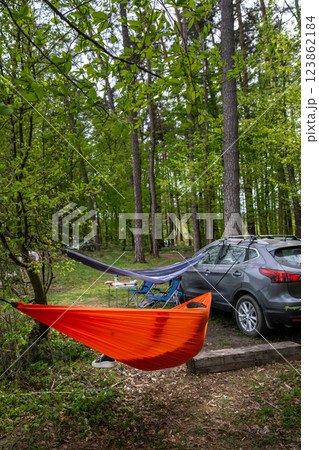 Forest Campsite with Hammocks and Car 123862184