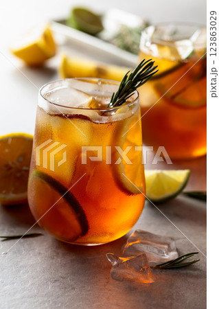 Refreshing hard seltzer with lemon, lime and ice garnished with rosemary twigs. Refreshing hard seltzer with lemon, lime and ice garnished with rosemary twigs. 123863029