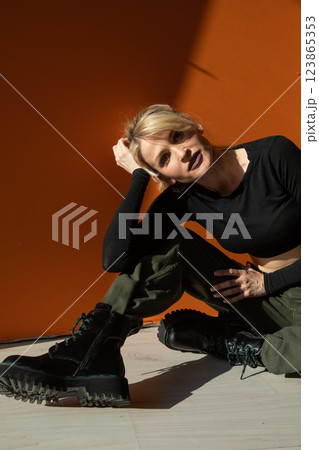 Beautiful fashion blonde woman in military clothes 123865353