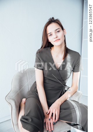 Beautiful Slim Woman in Green Summer Dress on White Background Beautiful Slim Woman in Green Summer Dress on White Background 123865547