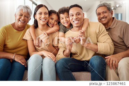 House, portrait and happy big family love enjoying quality time, gathering and having fun bonding in Colombia. Mother, father and elderly grandparents relaxing on a sofa with young children siblings House, portrait and happy big family love enjoying quality time, gathering and having fun bonding in Colombia. Mother, father and elderly grandparents relaxing on a sofa with young children siblings 123867461