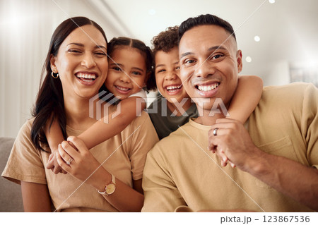 Hug, children and parents on the sofa in the living room of house for love, care and happiness. Portrait of happy and young kids hugging mother and father with affection in the lounge of their home Hug, children and parents on the sofa in the living room of house for love, care and happiness. Portrait of happy and young kids hugging mother and father with affection in the lounge of their home 123867536