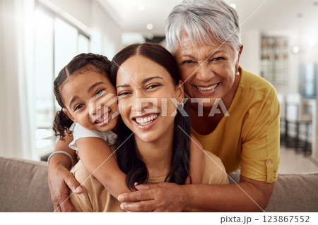 Child, mother and grandmother portrait while at home on sofa with smile, love and support sharing hug for generation of senior, woman and child. Portrait of brazil girls happy on mothers day together Child, mother and grandmother portrait while at home on sofa with smile, love and support sharing hug for generation of senior, woman and child. Portrait of brazil girls happy on mothers day together 123867552