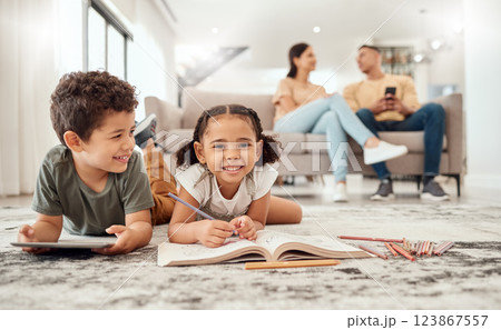 Happy family, learning and kids on a floor, drawing, bonding and relax with parents on sofa in the background. Children, learning and family quality time in a living room with boy and girl having fun 123867557