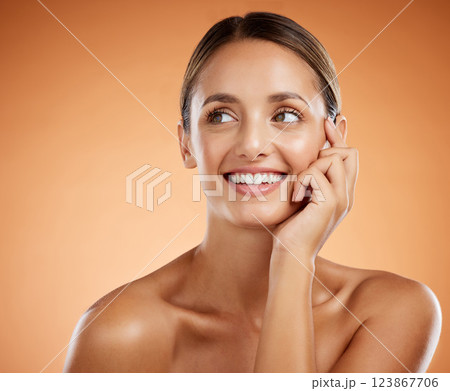 Face, portrait and skincare for beauty woman with smile for facial health against an orange mockup studio background. Cosmetic model happy about natural wellness and dermatology with mock up space 123867706