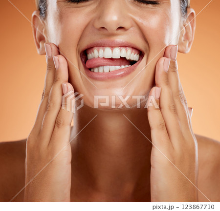 Woman, teeth and smile for dental, care and clean hygiene in health isolated against a studio background. Closeup of happy toothy woman smiling in beauty for hygienic mouth, oral and gum treatment 123867710