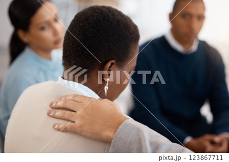 Mental health, support and black woman in a counseling therapy session with a group of people helping with stress. Meeting, anxiety and depressed employee sad in debt, grief and depression at work 123867711
